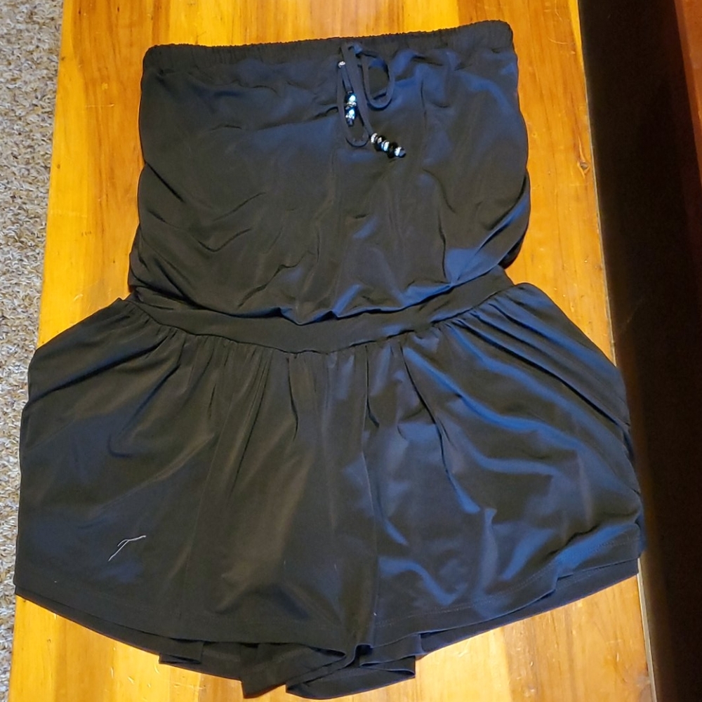 Sleveless black bathing suit cover/ romper.